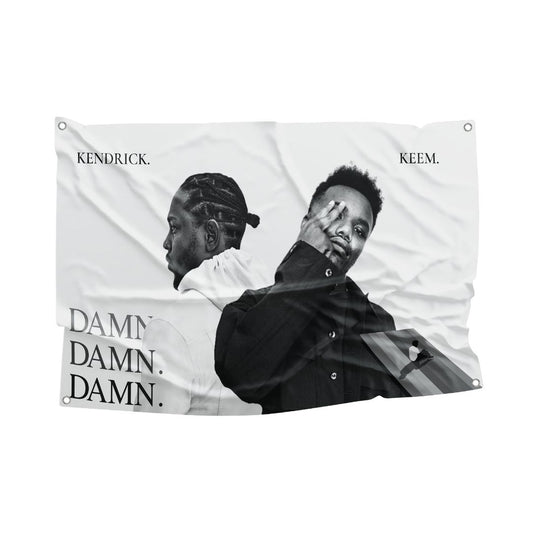 Monochromatic flag featuring Kendrick Lamar and Baby Keem with bold typography.