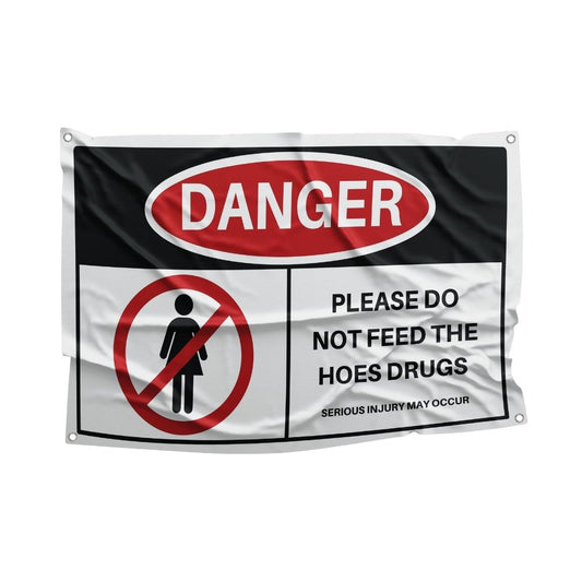 Satirical safety flag featuring prohibition sign over a man with text "DANGER PLEASE DO NOT FEED THE HOES DRUGS" on a black and white background