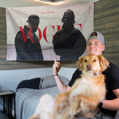 guy and dog in front of drake and 21 savage flag