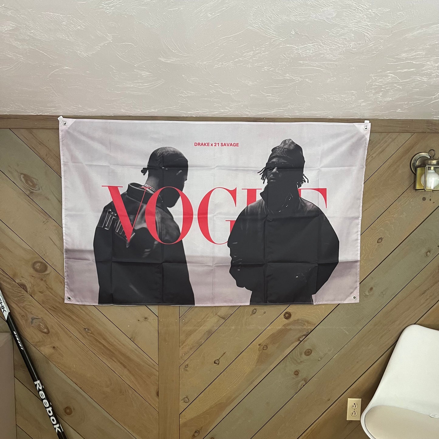 Drake & 21 Savage flag displayed in a chic room, emphasizing the stylish and iconic imagery of the two artists, perfect for music enthusiasts and urban decor.