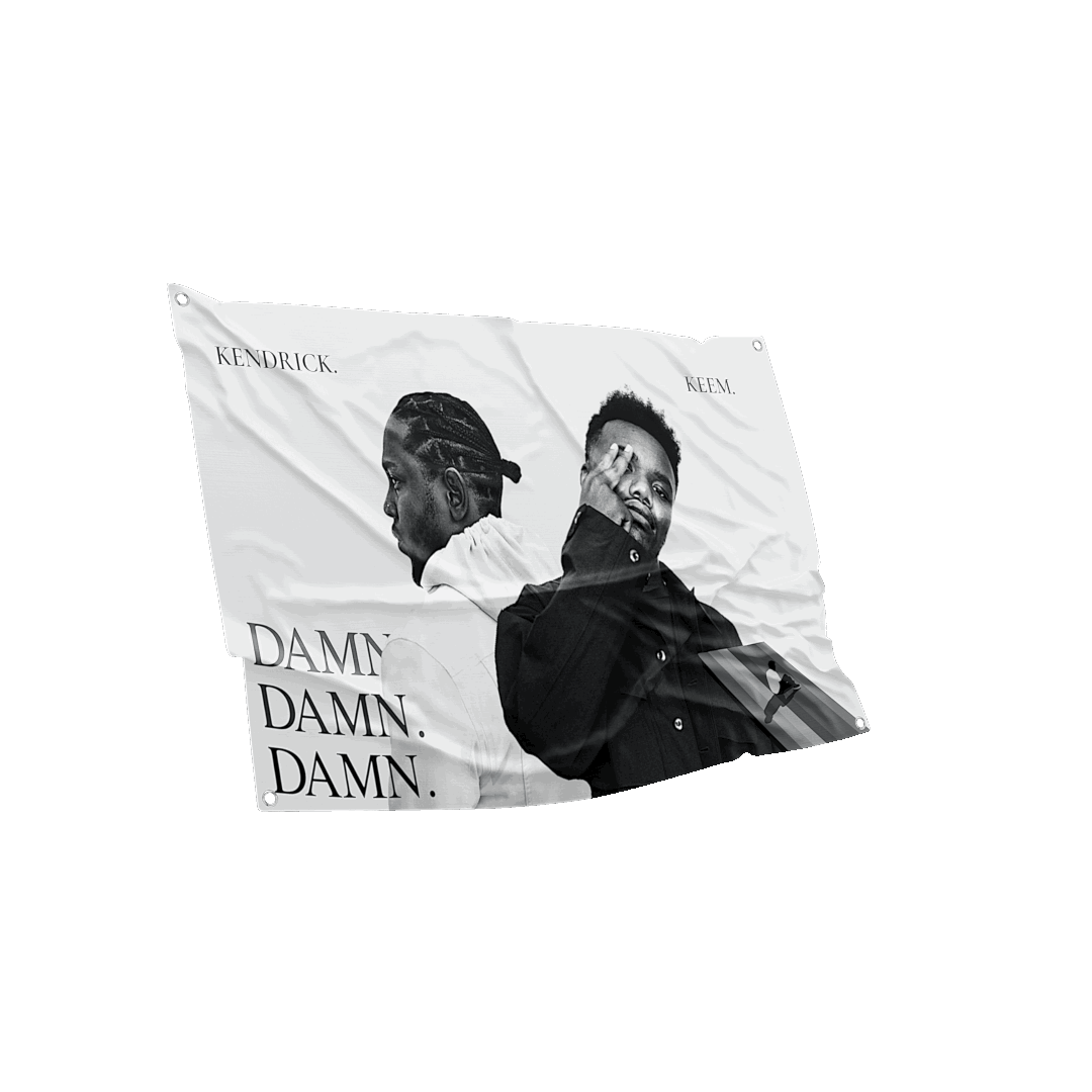 Dramatic angled view of a Kendrick Lamar and Baby Keem flag in monochrome.