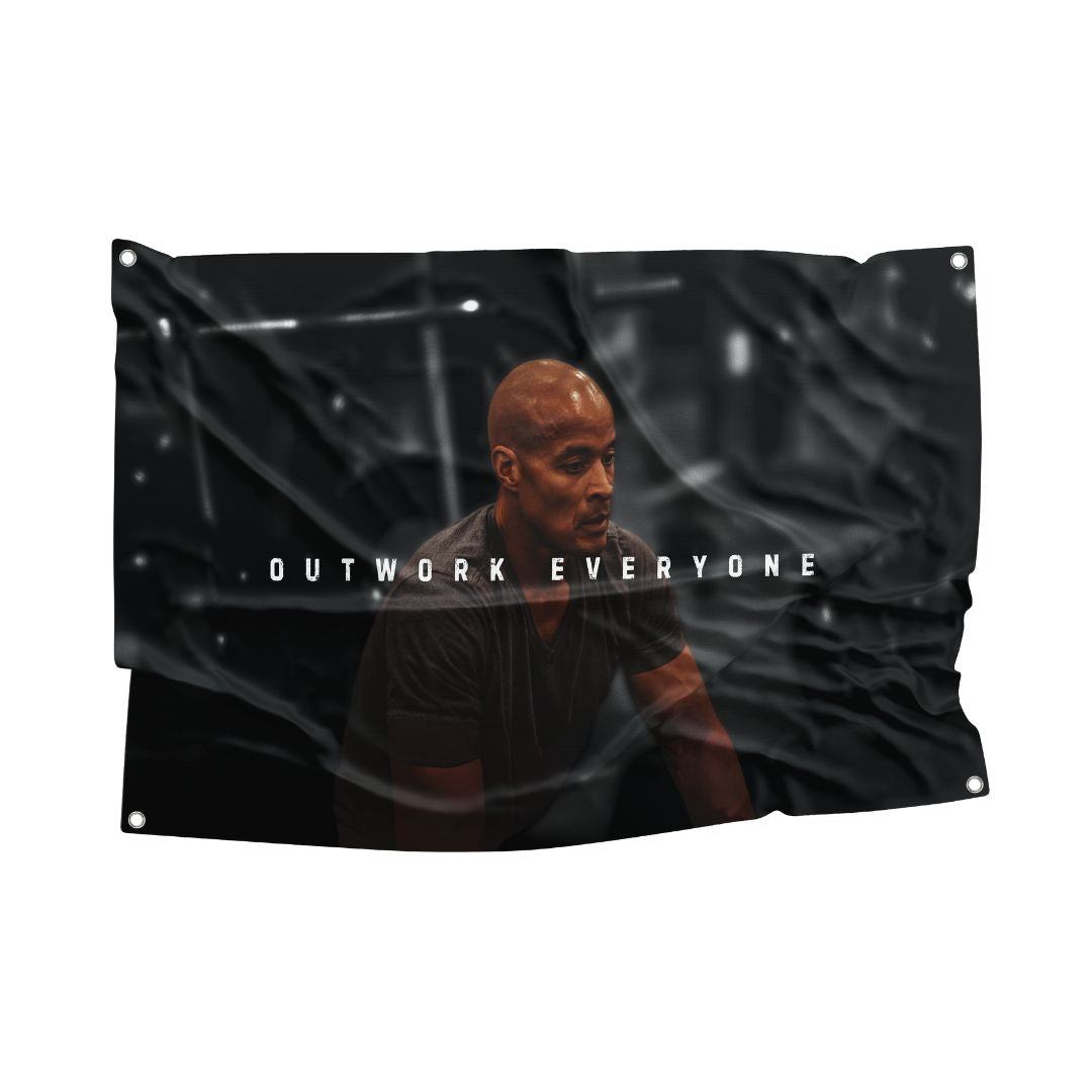 David Goggins flag featuring a powerful image of the motivational speaker and athlete, with the text "Elevate Your Hustle," perfect for fans and those who thrive on pushing limits and relentless dedication.