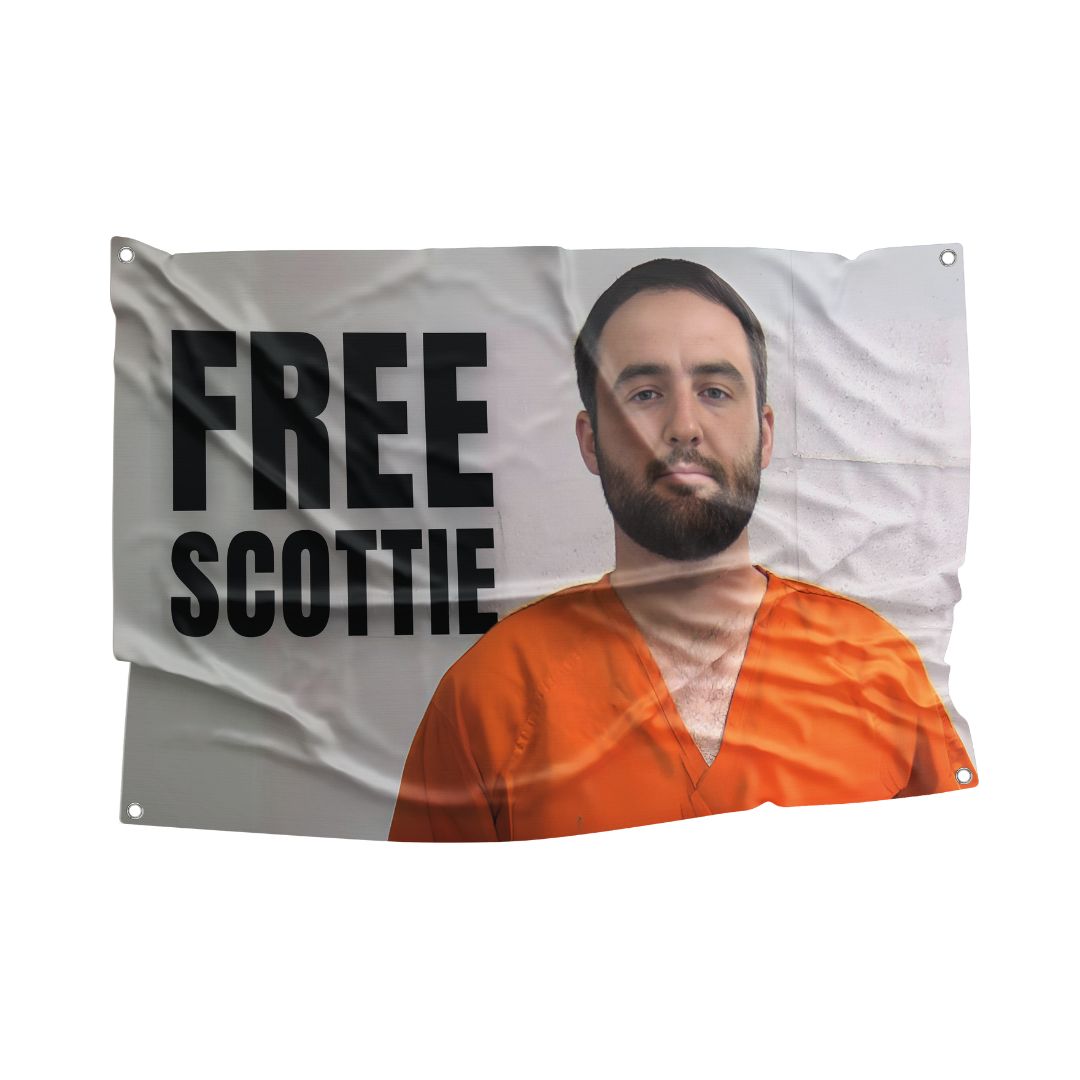 Free Scottie flag with a bold message and image of a man in an orange prison jumpsuit, perfect for expressing support and solidarity.