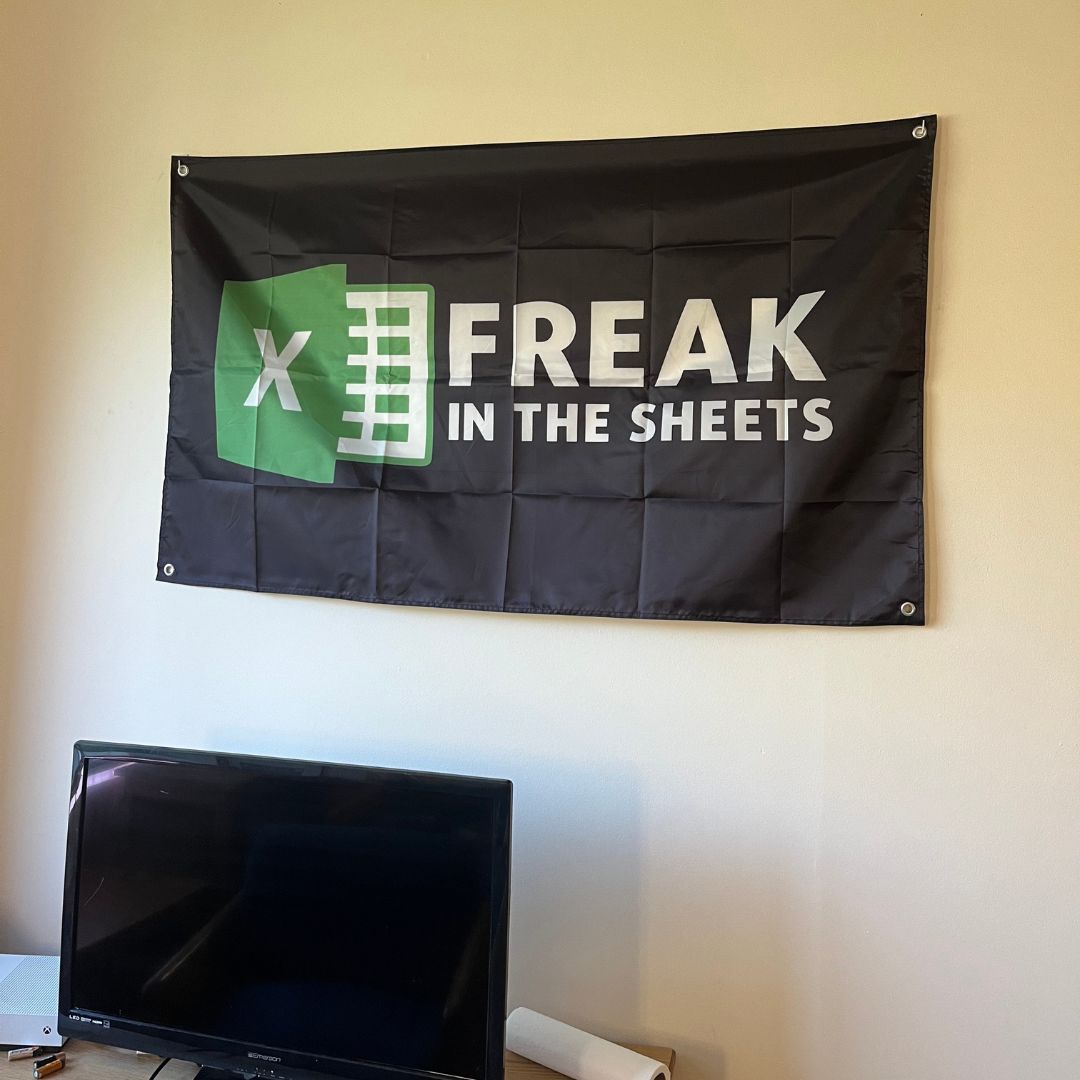 Creative room decor with 'Freak in the Sheets' flag, highlighting a spreadsheet theme, ideal for tech-savvy decorators