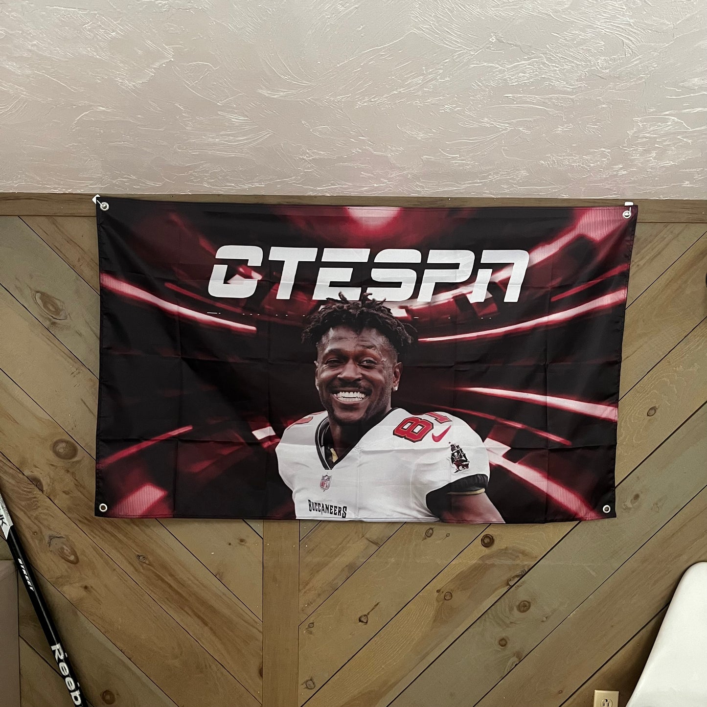 Antonio Brown CTESPN flag displayed in a stylish room, adding a touch of NFL pride to the decor, perfect for football fans and sports bar decorations