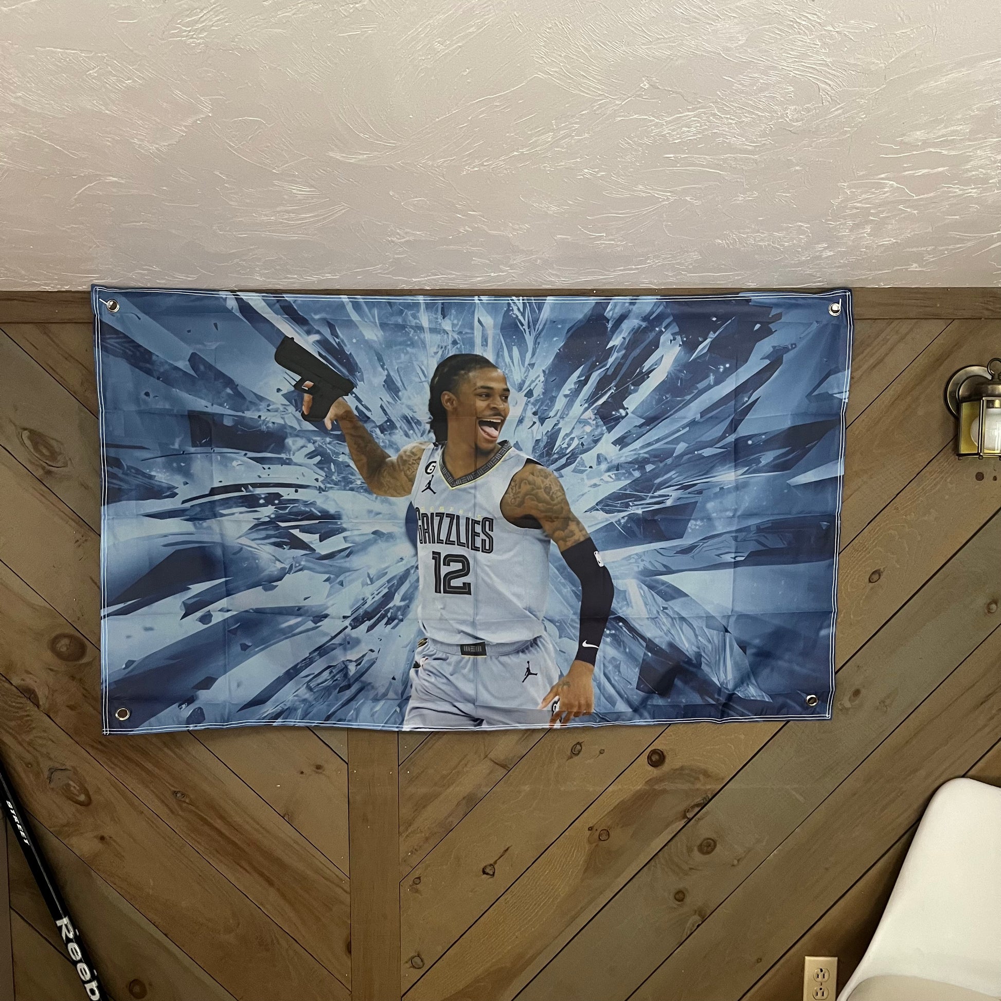 Ja Morant flag displayed in a modern room, emphasizing the vibrant colors and dynamic design of the player in action, ideal for adding a sporty touch to any decor.